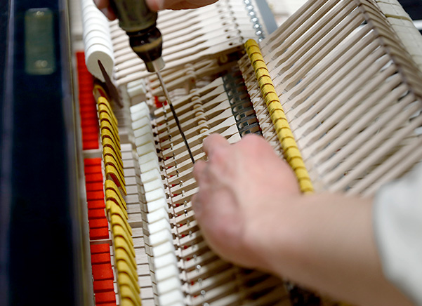 Yamaha Kakegawa piano factory in Japan showing expert grand piano craftsmanship