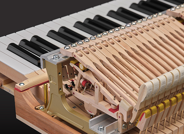 Close-up of the Yamaha GCB grand piano keyboard and precision action