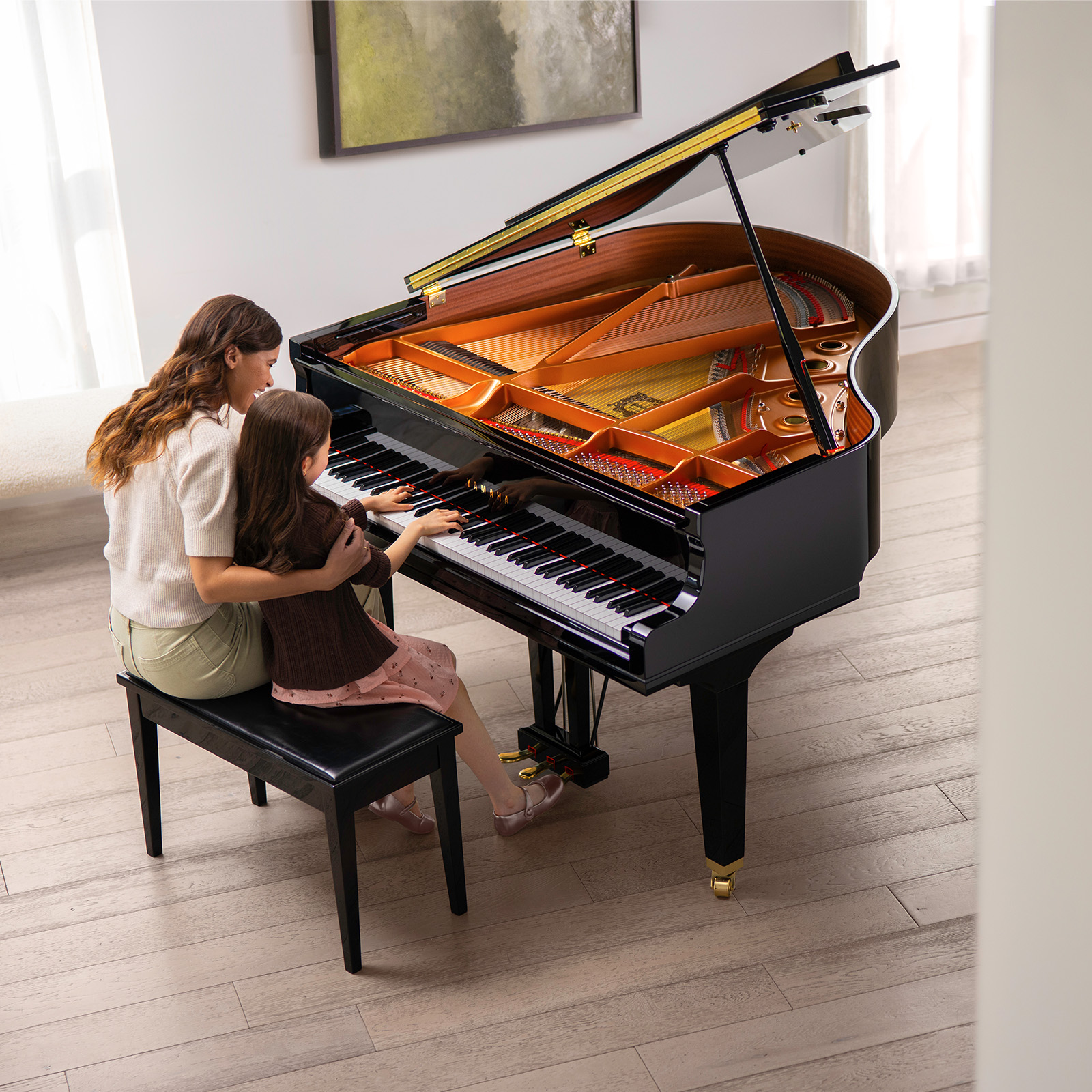 Yamaha GCB SH3 Silent baby grand piano in polished ebony in a contemporary living room