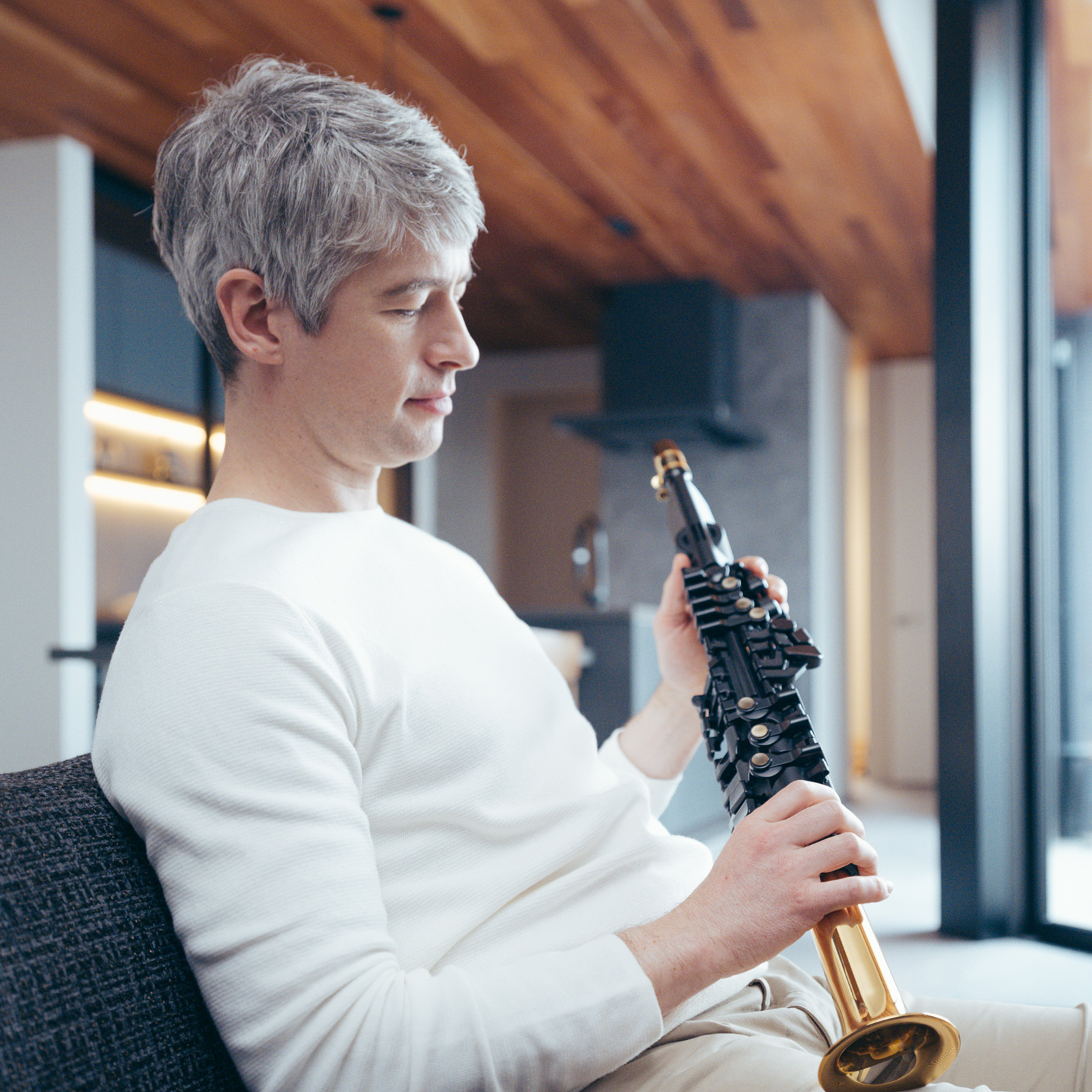 Musician playing the Yamaha YDS-152 digital saxophone