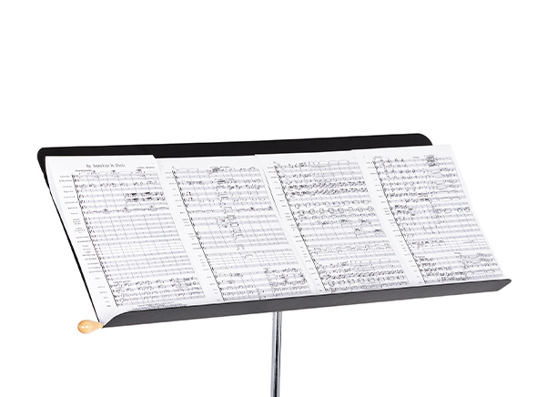 Music stand desk with four sheets of music side by side