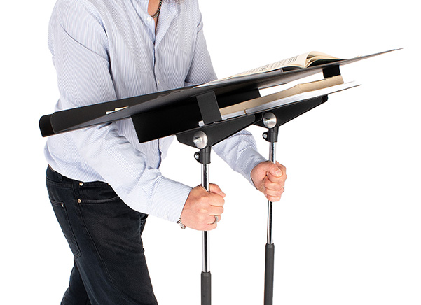 Person adjusting the regal music stand with two shafts for extra stability