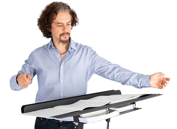 Person conducting behind the stand