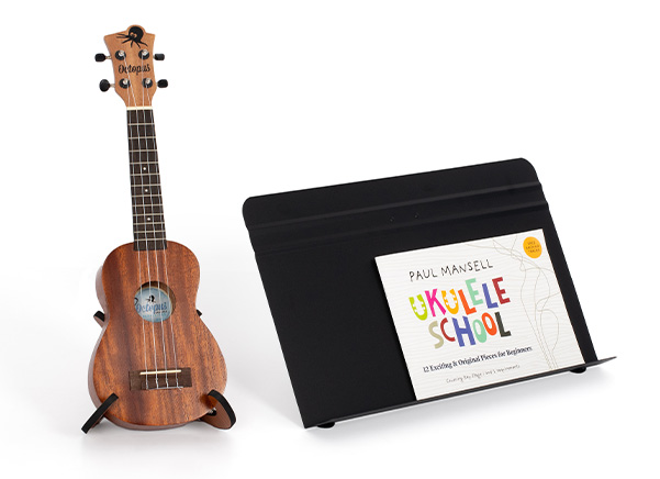 Tabletop stand with ukulele next to it
